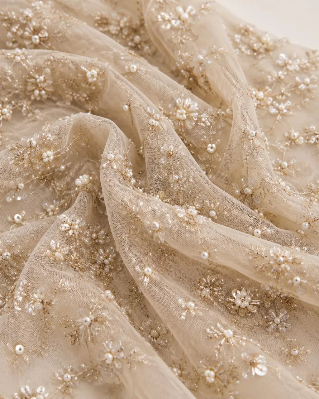 Champagne sheer fabric with cut-dana, pearl and sequin floral embellishment