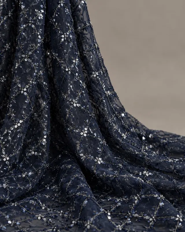 Midnight navy net fabric with all-over sequin trellis embellishment